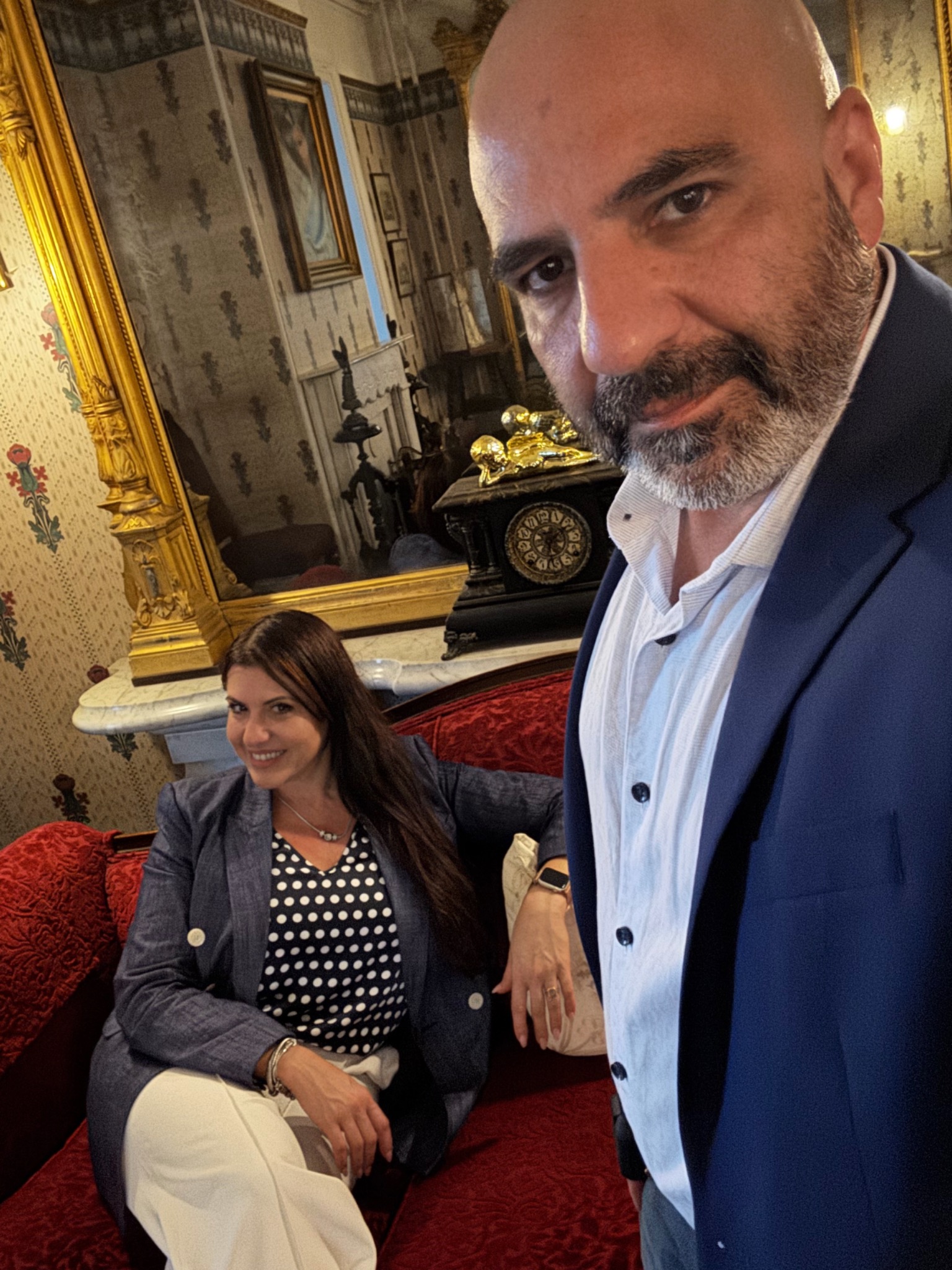 Yoly and Angel together in an elegant interior, founders of ScreamingColours Atelier